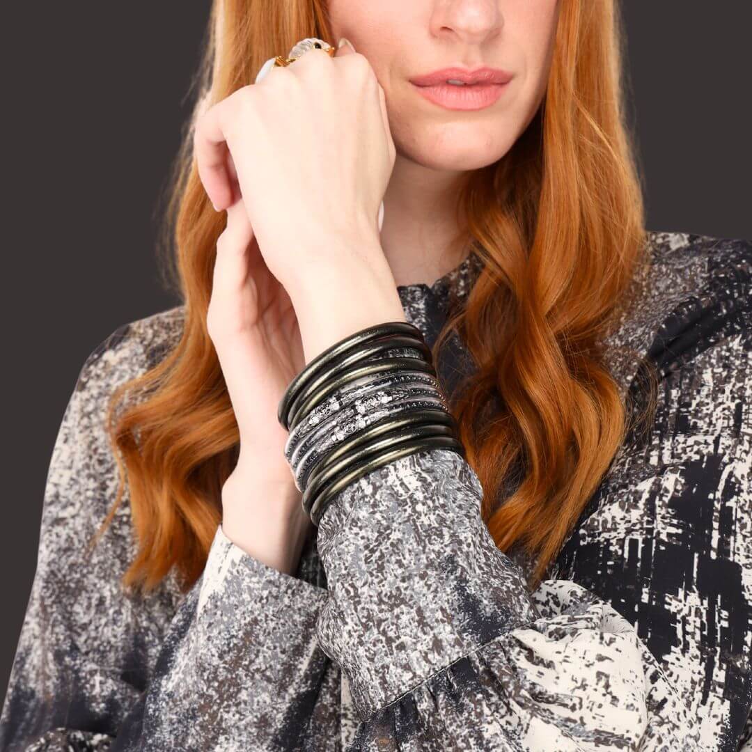 women wearing Black Spinel Three Queens All weather Bangle.