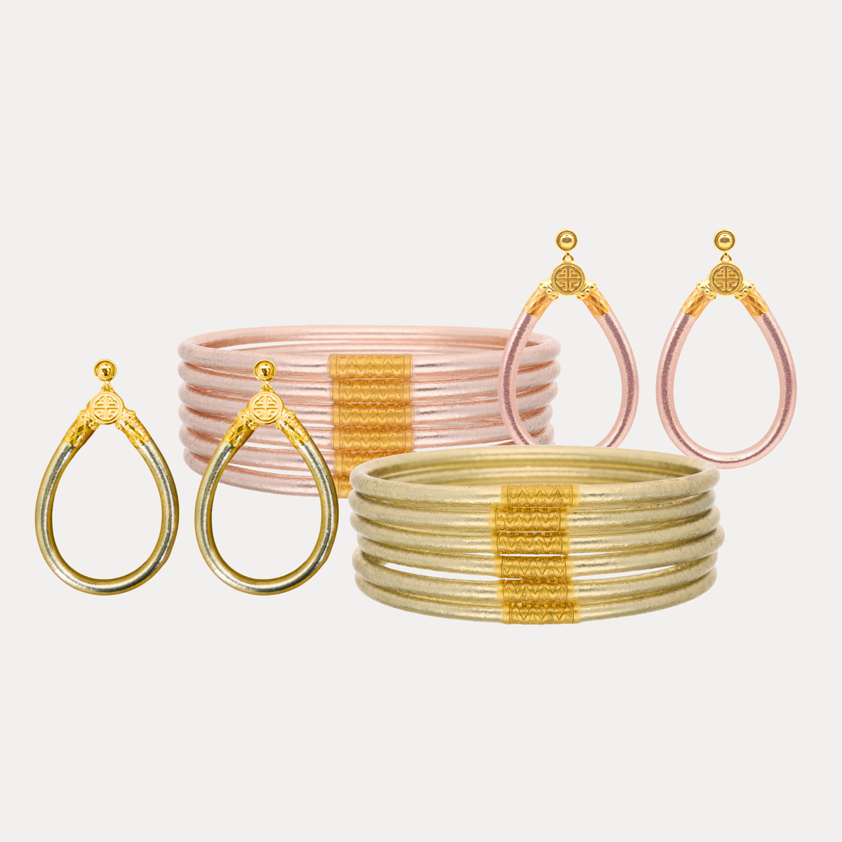 a group of bracelets and earrings