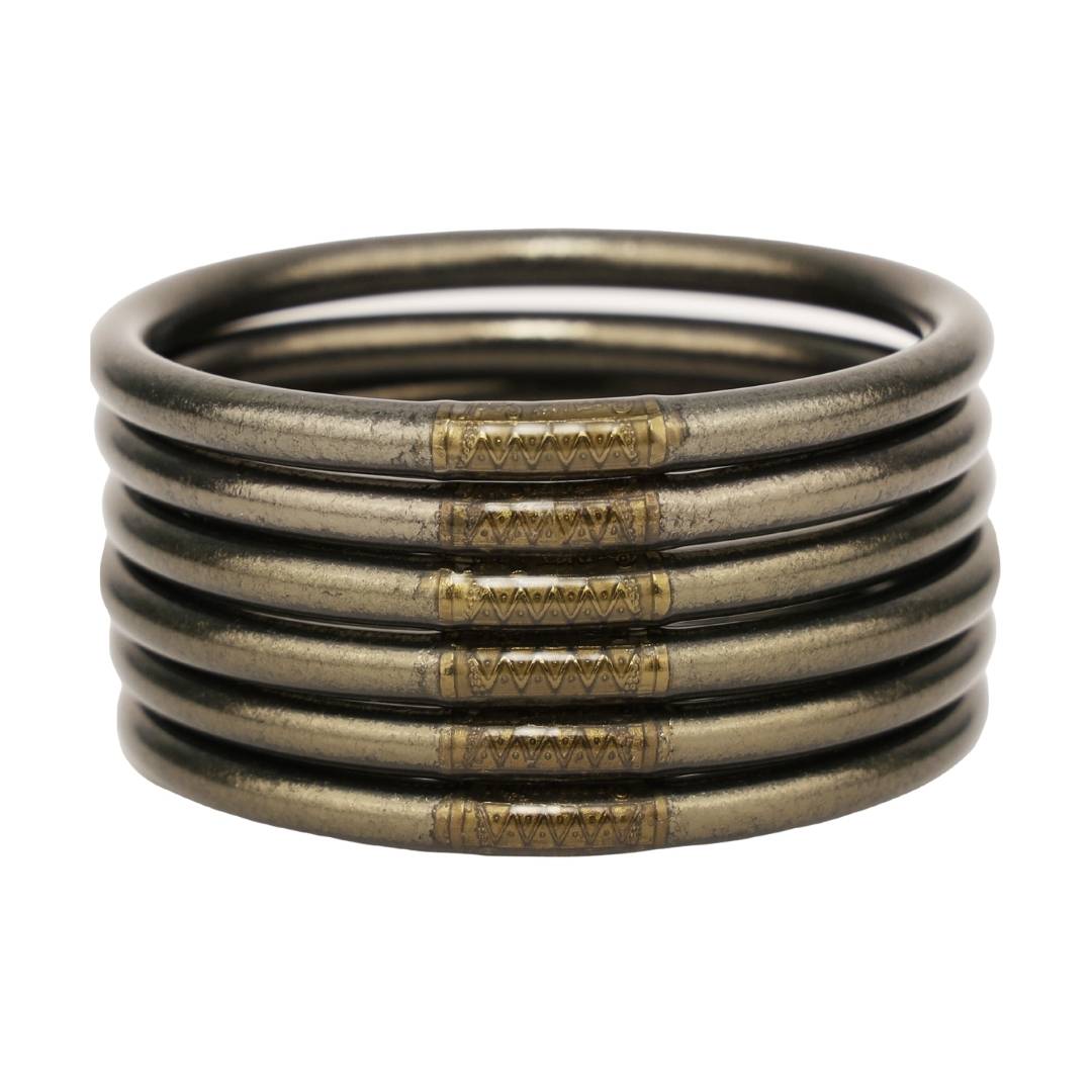 A stack of Flint All Weather Bangles, which are made of polyvinyl carbonate tubing that will last for years to come. The bangles are available in four sizes, Small, Medium, Large & Extra Large.