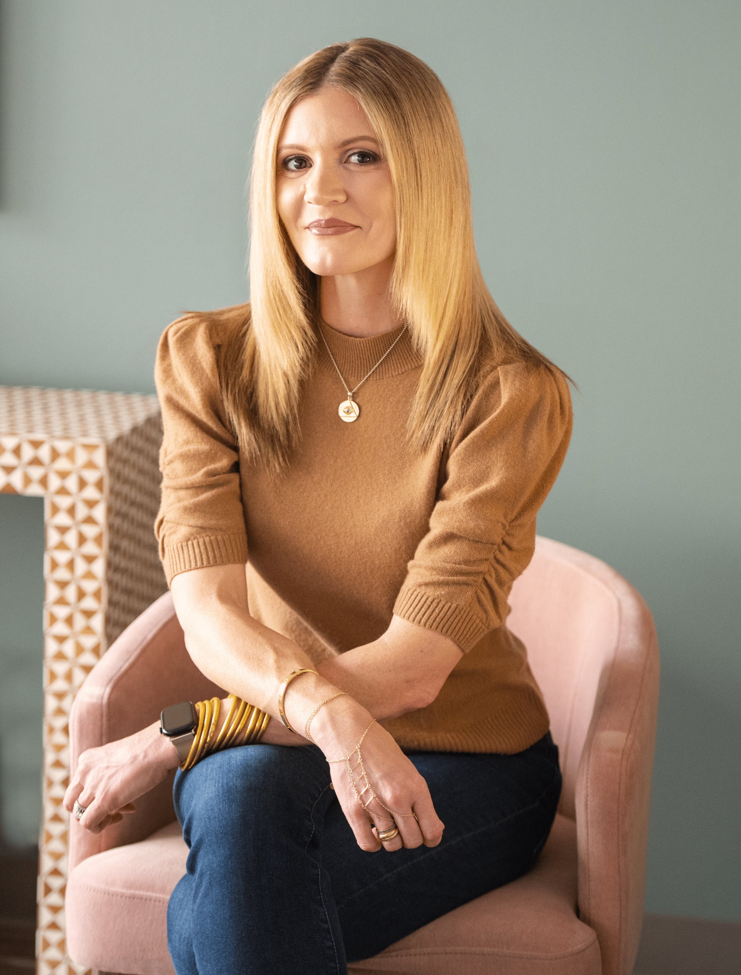 a woman sitting in a chair