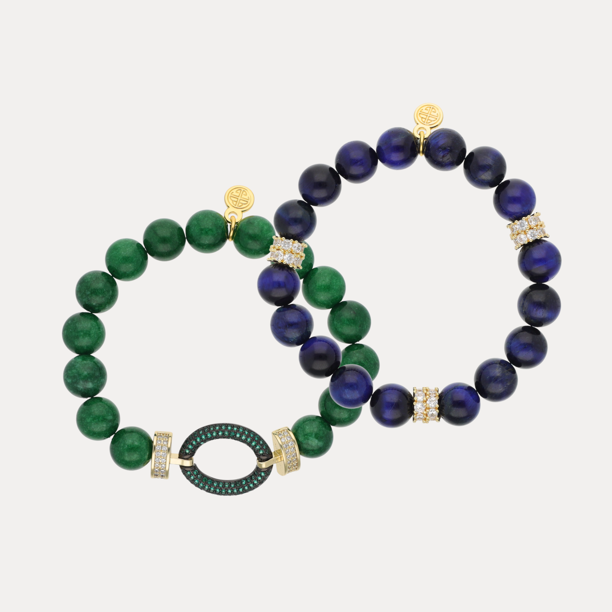 The Imperial Cosmos Bundle featuring green and blue bangle bracelets with gold and pavé detail.