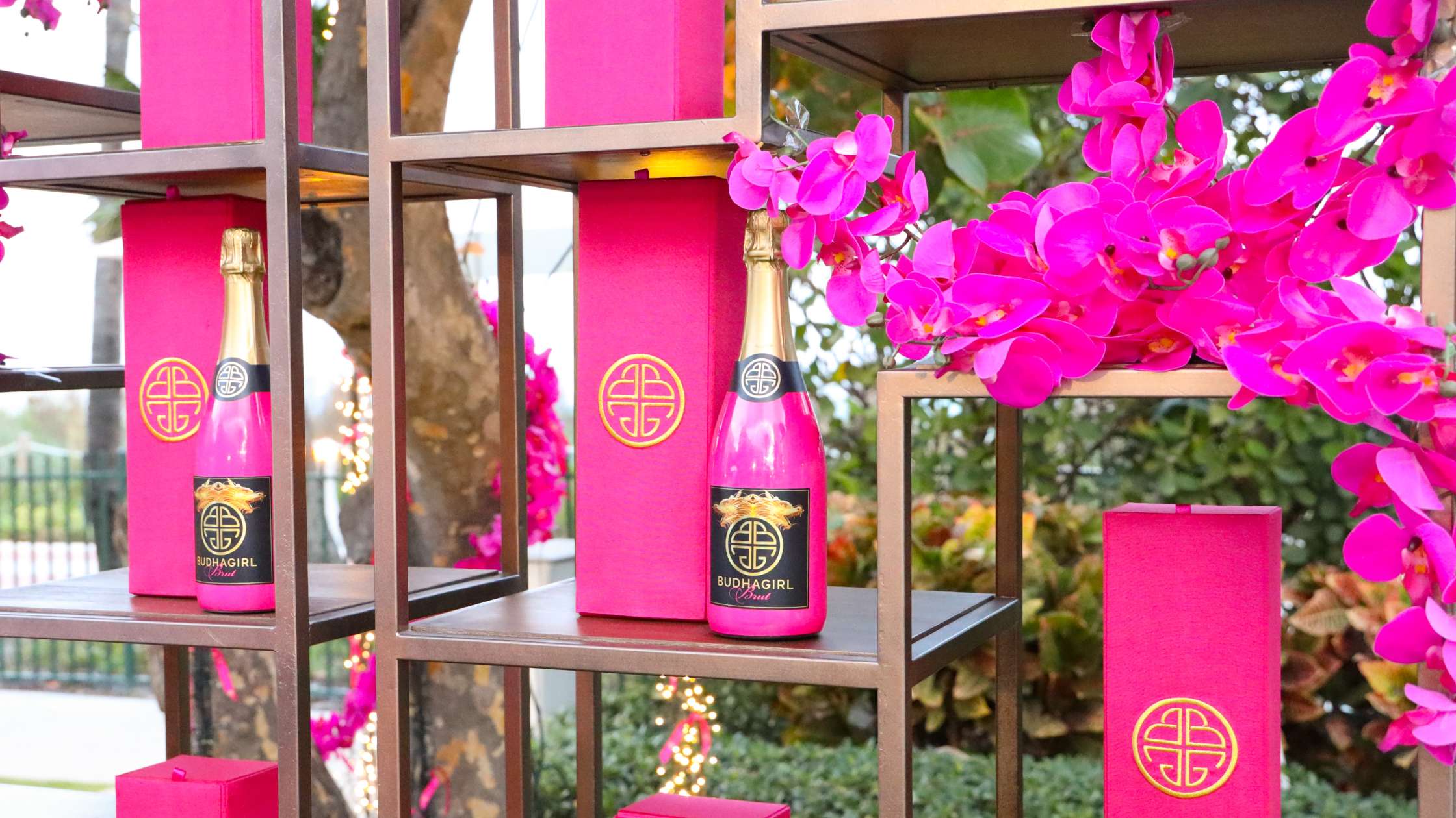BuDhaGirl Sparkling Wines Bottles and Pink Silk Boxes on Display at Ocean Drive Magazine's Art of the Party During Art Basel Miami Beach | BuDhaGirl