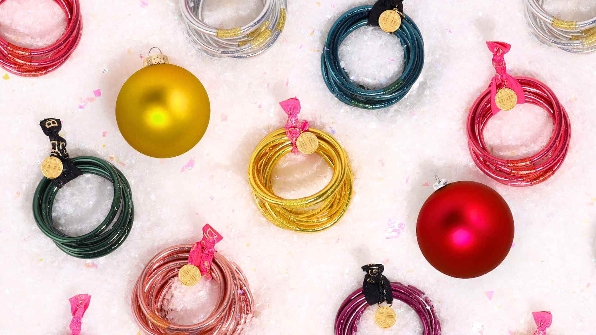 The BuDhaGirl Gift Guide | Gifts Under $200 | BuDhaGirl All Weather Bangles in Snow with Christmas Ornaments