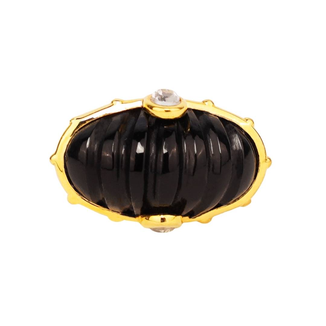 BuDhaGirl gold ring with a black dome resin stone and a crystal on a white background