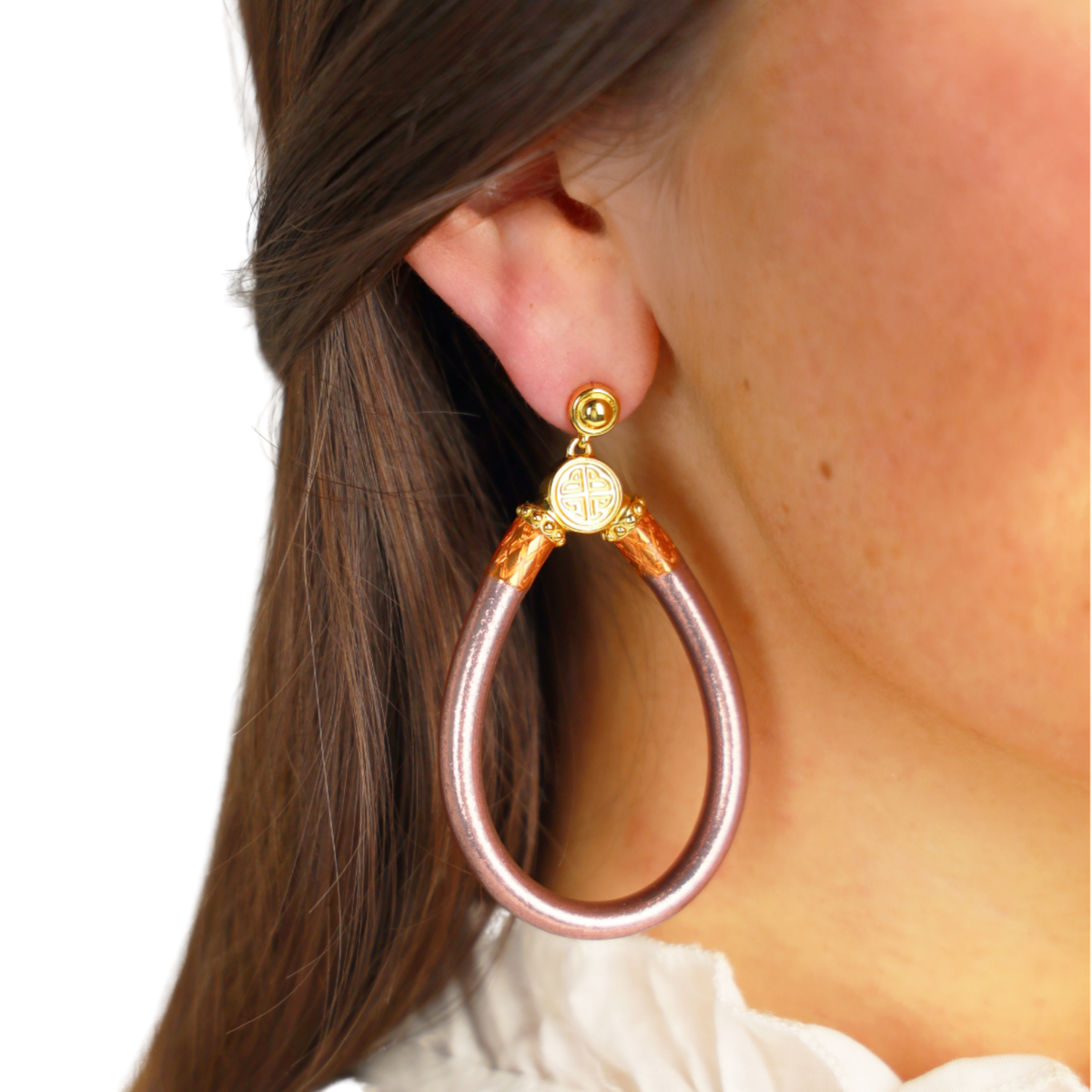 a close up of a woman's ear