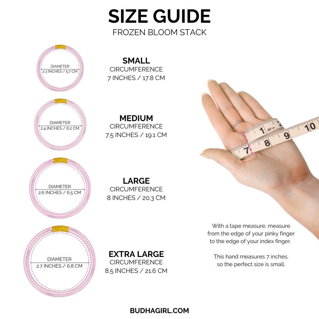 a hand measuring size of a flower