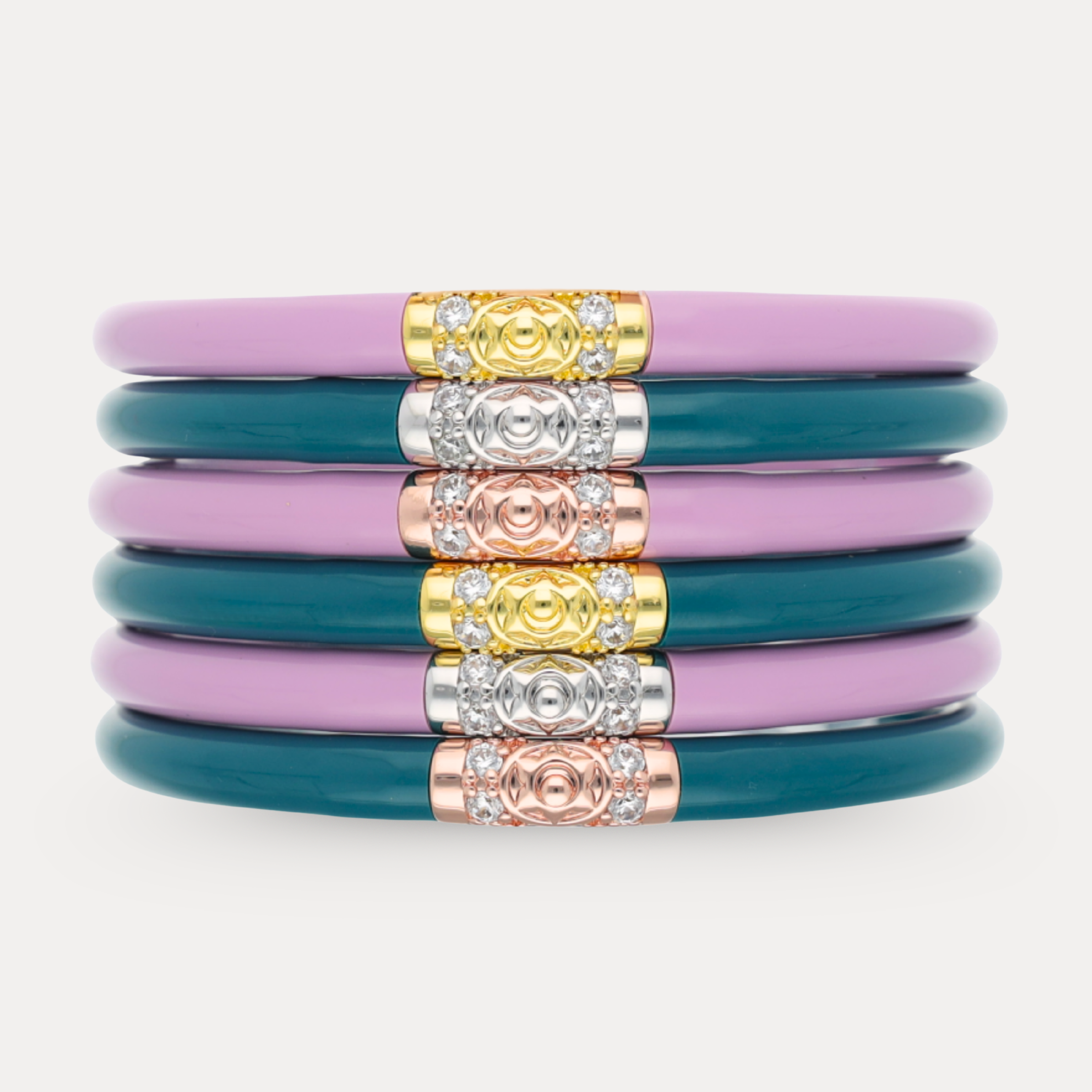 a stack of colorful bracelets