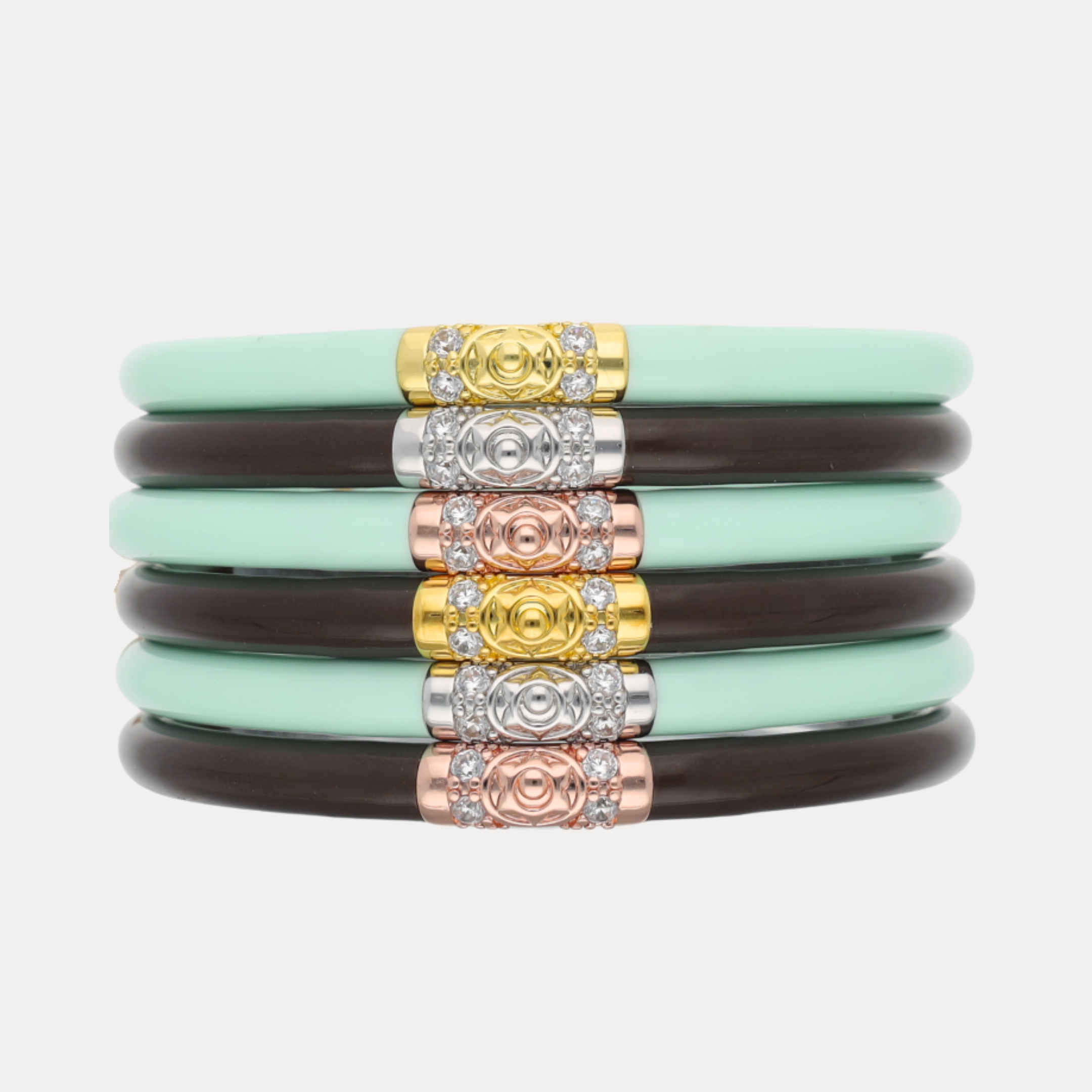 a stack of bracelets with different colored bands