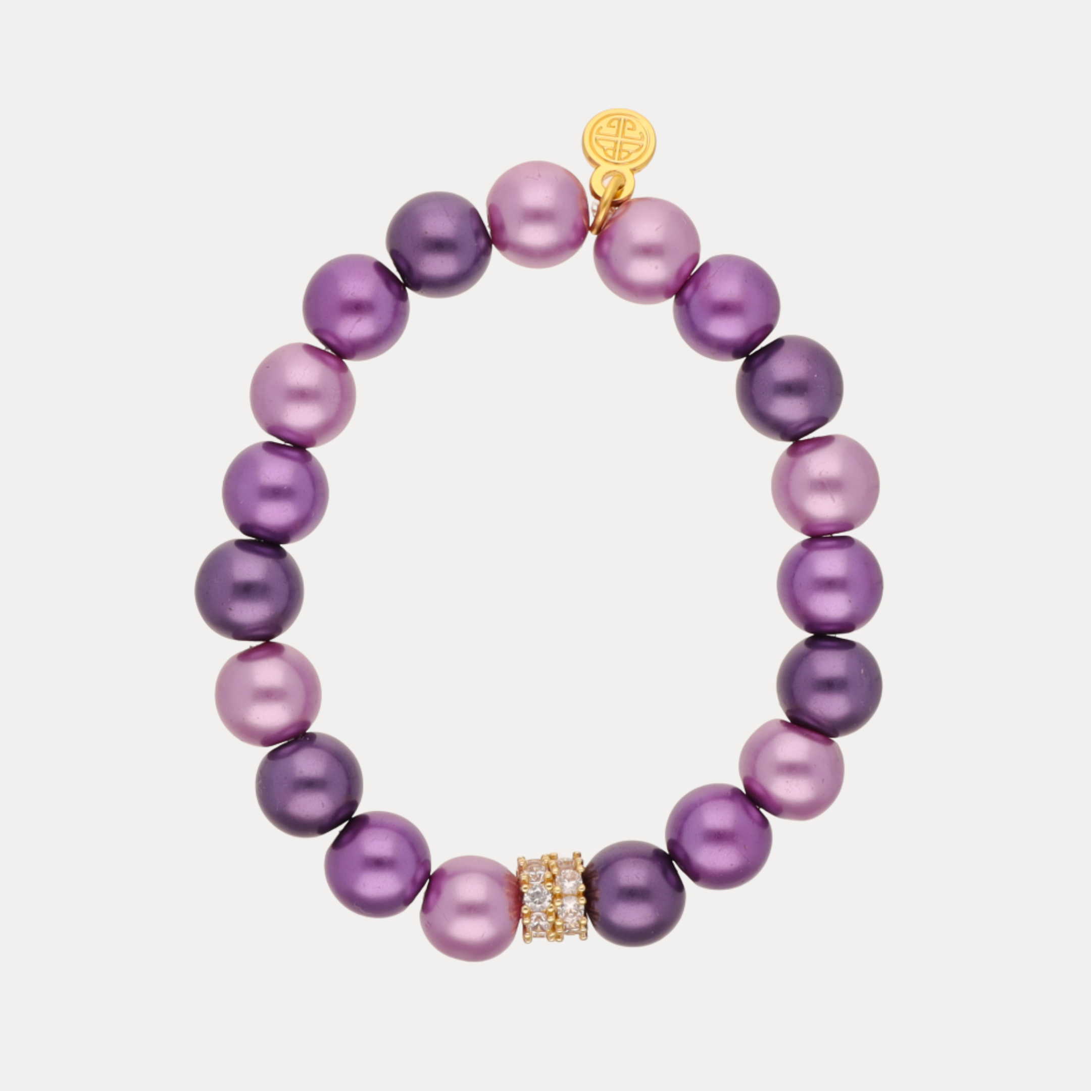 a purple and gold beaded bracelet