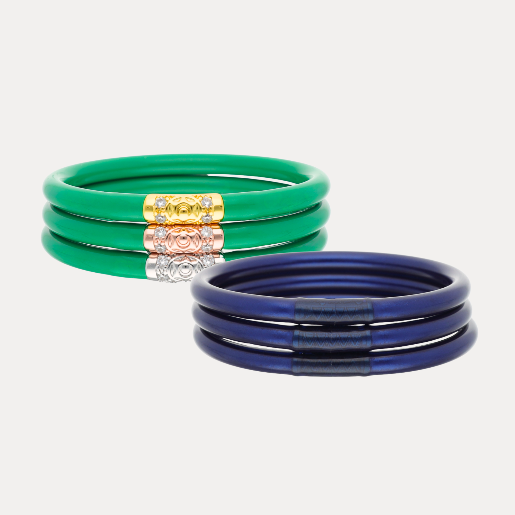 The Midnight Kelly Bundle featuring vibrant green and metallic navy bangle bracelets, showcasing timeless preppy style.