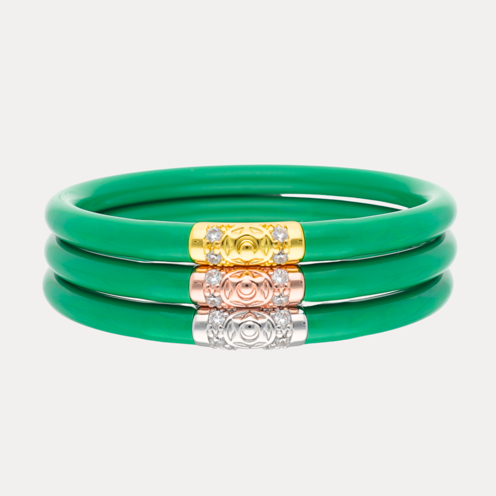 Three Kings All Weather Bangles® (AWB®) - Kelly in vibrant green, featuring gold, rose gold, and silver accents.