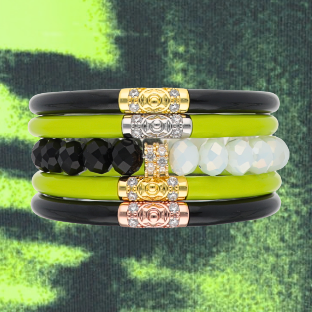 a stack of bracelets with different colors