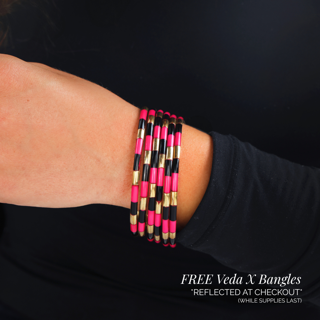 a person wearing bracelets on their wrist